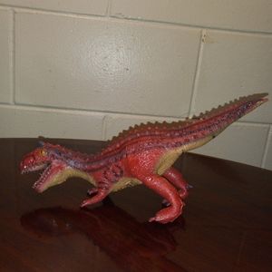 2 Disney Dinoland Animal Kingdom Rubber Latex Carnotaurus and T-Rex Dinosaurs